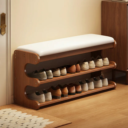 Bamboo shoe storage bench with padded seat in natural finish, featuring a space-saving design ideal for entryway organization. 6