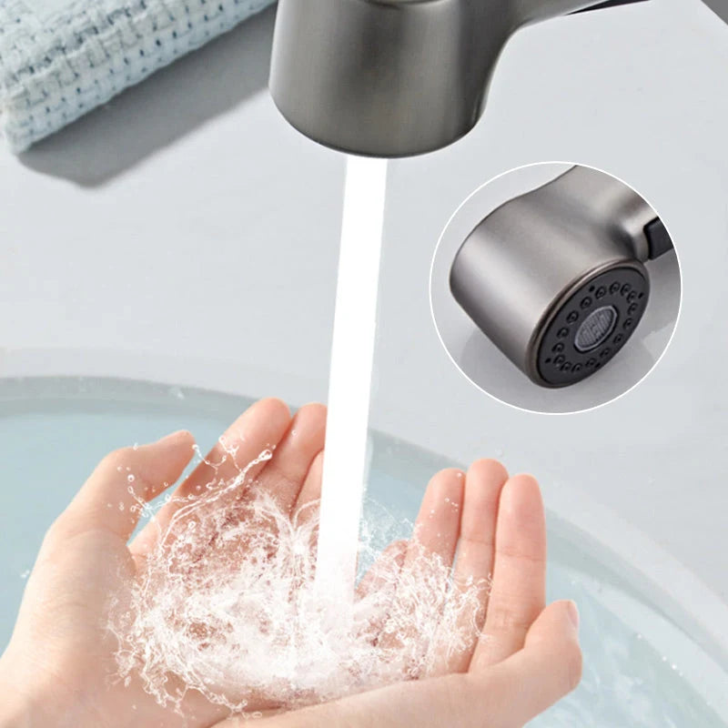 Sleek bathroom faucet with pull-out spray head and 360-degree swivel spout, designed for modern small spaces. 5