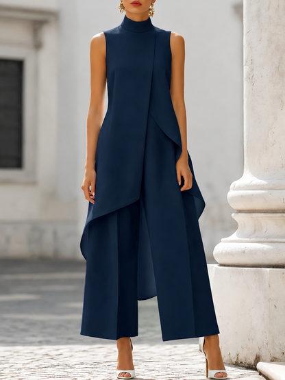Elegant black jumpsuit for women featuring a high neckline and draped overlay, designed with a chic wide-leg silhouette, perfect for special occasions. 5