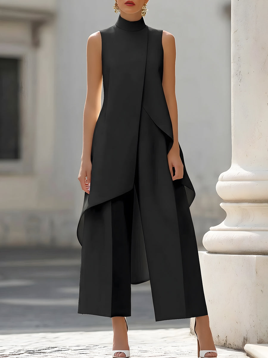 Elegant black jumpsuit for women featuring a high neckline and draped overlay, designed with a chic wide-leg silhouette, perfect for special occasions. 6