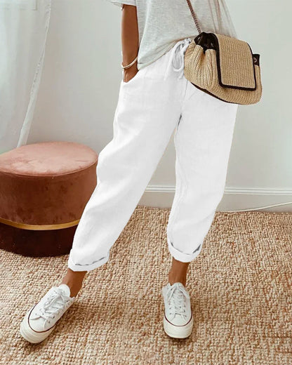 Breathable high-waist pants featuring a flowing silhouette and smooth finish, crafted from lightweight fabric for ultimate comfort and versatility. 4
