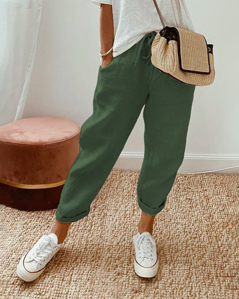 Breathable high-waist pants featuring a flowing silhouette and smooth finish, crafted from lightweight fabric for ultimate comfort and versatility. 5