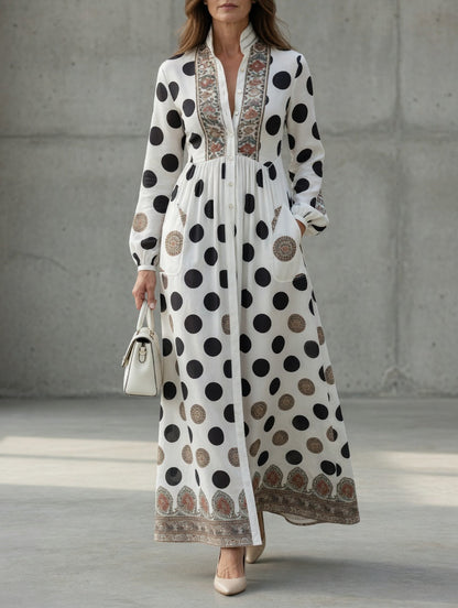 Button-front maxi dress with long cuffed sleeves and side pockets, featuring a stylish polka dot print for women. 0
