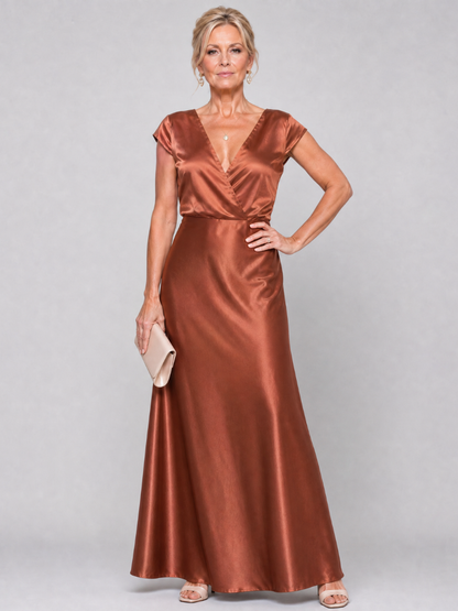 Elegant white cap sleeve maxi dress featuring a wrap bodice and flattering V neckline, perfect for formal occasions and summer events. 4