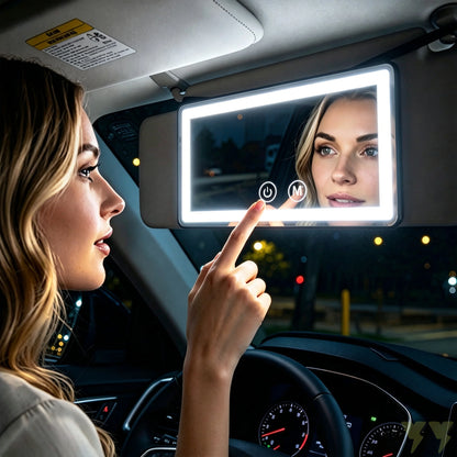 Car visor mirror with dimmable LED lighting, adjustable makeup mirror for on-the-go grooming, featuring a sleek black plastic and glass design. 0