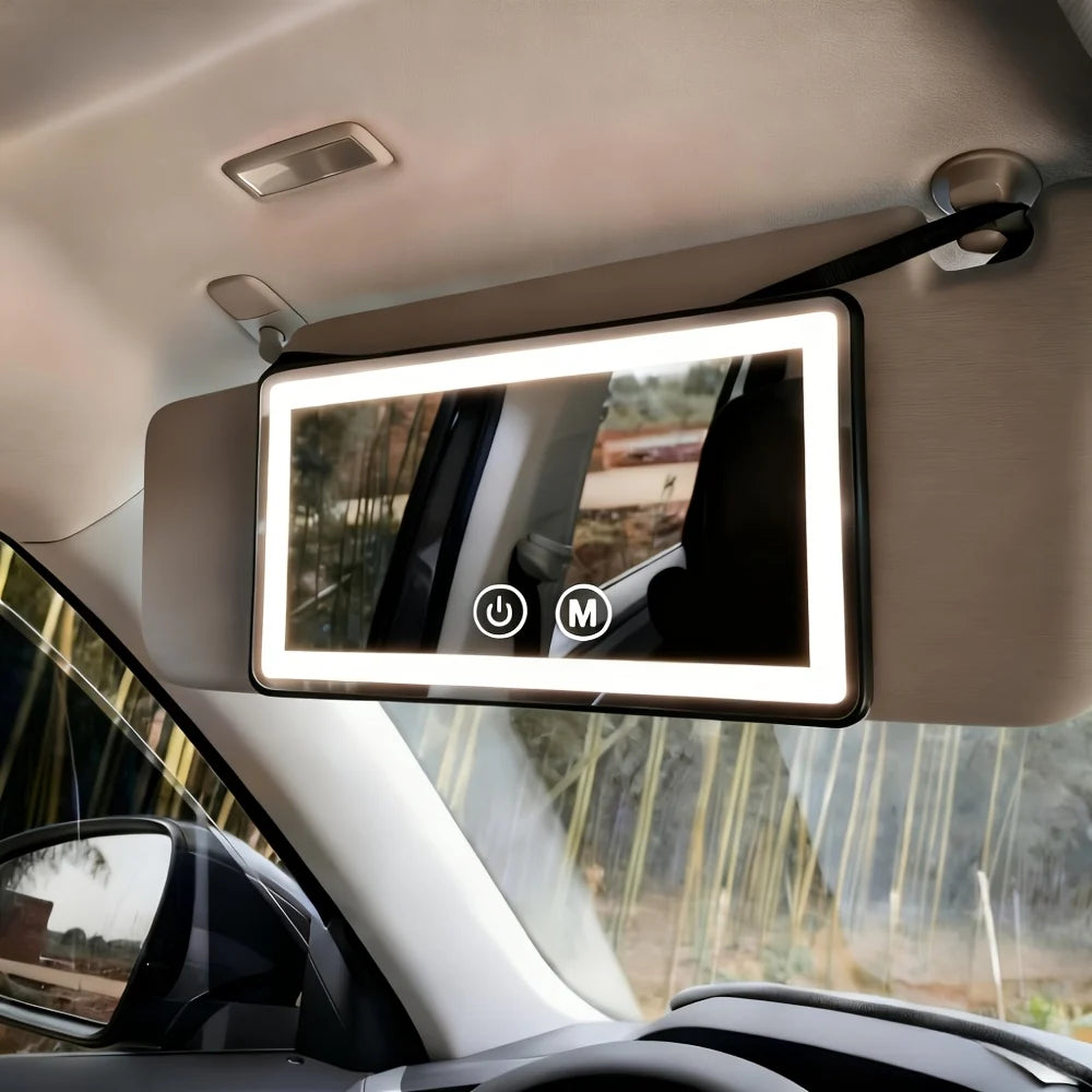 Car visor mirror with dimmable LED lighting, adjustable makeup mirror for on-the-go grooming, featuring a sleek black plastic and glass design. 1