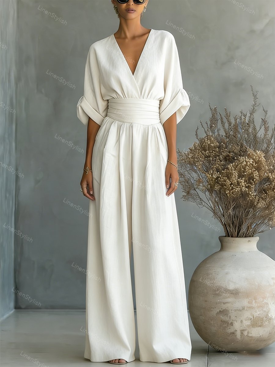 Casual V-Neck Jumpsuit for Women featuring a flattering waistline, made from soft and comfortable fabric, available in black and white options. 0
