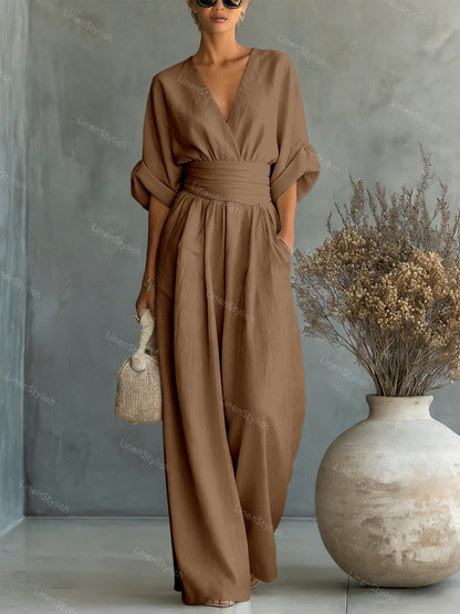 Casual V-Neck Jumpsuit for Women featuring a flattering waistline, made from soft and comfortable fabric, available in black and white options. 10