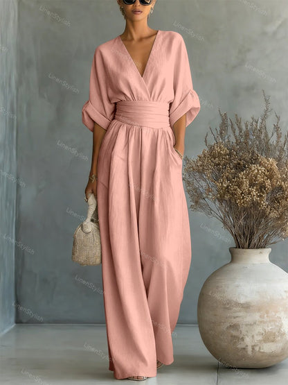 Casual V-Neck Jumpsuit for Women featuring a flattering waistline, made from soft and comfortable fabric, available in black and white options. 13