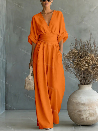 Casual V-Neck Jumpsuit for Women featuring a flattering waistline, made from soft and comfortable fabric, available in black and white options. 14