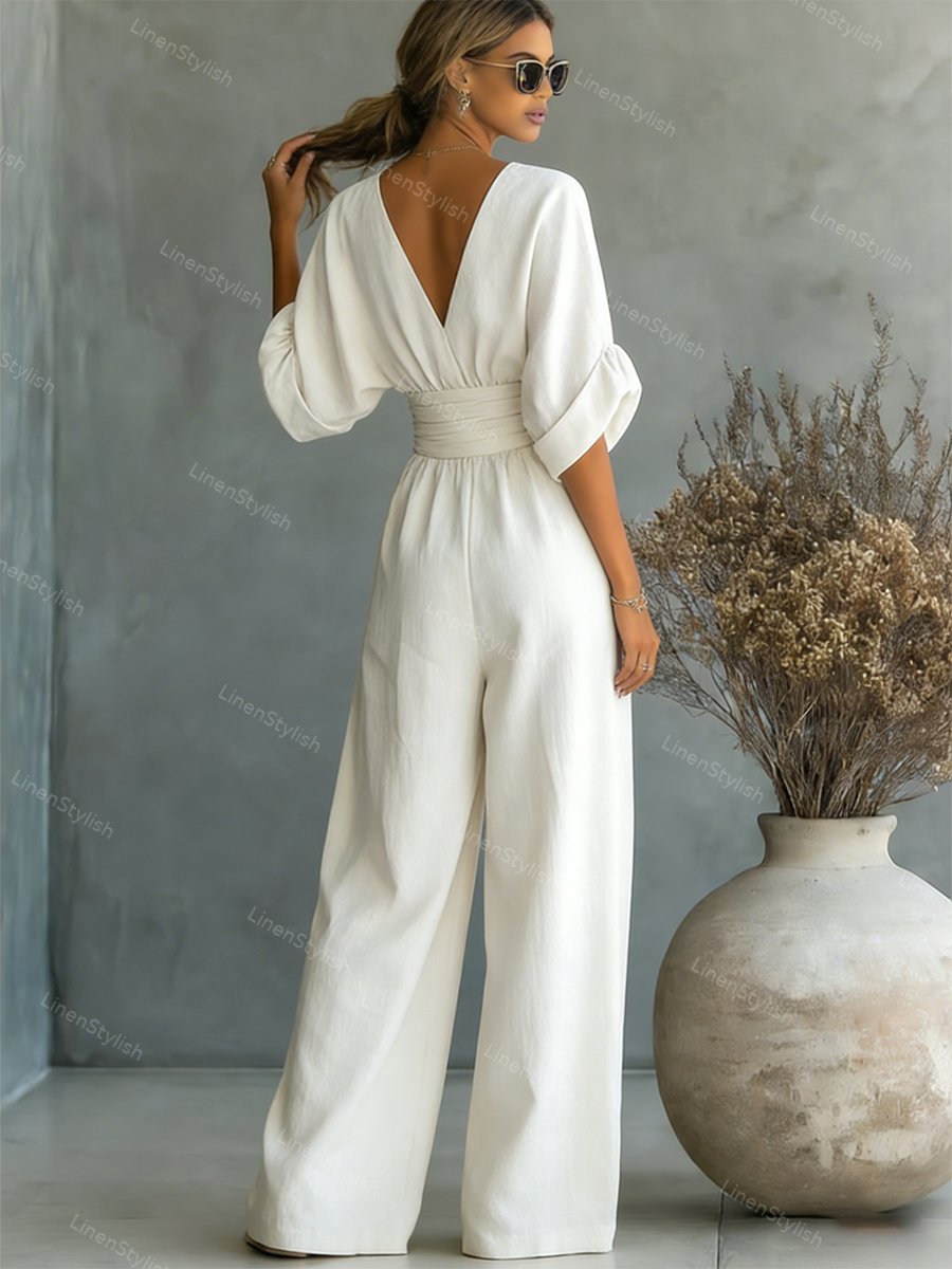 Casual V-Neck Jumpsuit for Women featuring a flattering waistline, made from soft and comfortable fabric, available in black and white options. 4