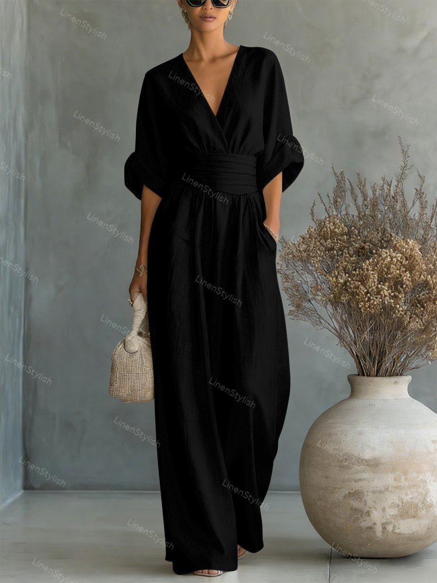 Casual V-Neck Jumpsuit for Women featuring a flattering waistline, made from soft and comfortable fabric, available in black and white options. 8