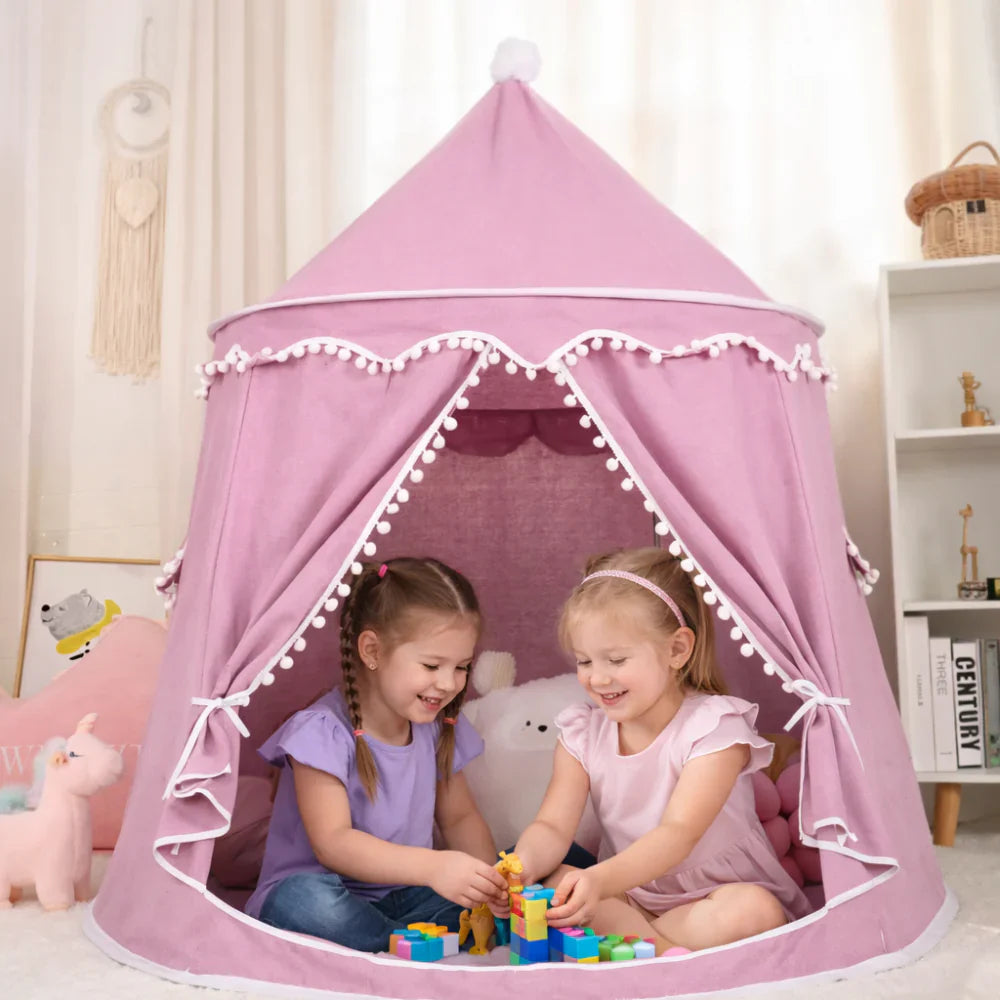 Children's canvas play teepee featuring solid pine poles, designed in a neutral style suitable for both indoor and outdoor play. 2