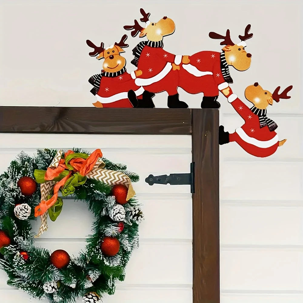 Christmas door frame decoration featuring reindeer and gift motifs, crafted from wood for festive indoor decor. 5