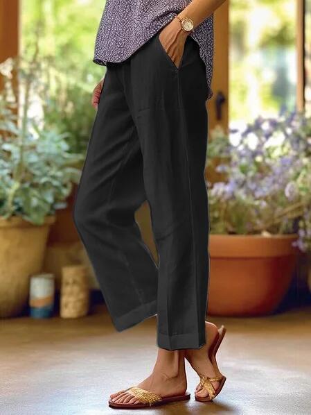 Coastal Breeze Trousers featuring a relaxed fit, lightweight fabric, and practical pockets, perfect for everyday wear. 3