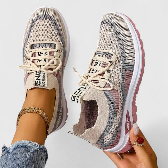 Comfort Support Sneakers featuring a shock-absorbing sole, designed for lightweight breathability and all-day comfort, perfect for active lifestyles. 1
