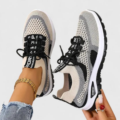 Comfort Support Sneakers featuring a shock-absorbing sole, designed for lightweight breathability and all-day comfort, perfect for active lifestyles. 2