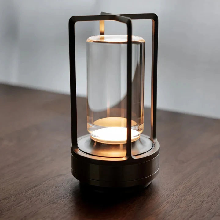 Cordless table lamp featuring a rechargeable LED design in Scandinavian style, available in gold, silver, and black finishes. 0