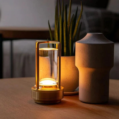 Cordless table lamp featuring a rechargeable LED design in Scandinavian style, available in gold, silver, and black finishes. 3