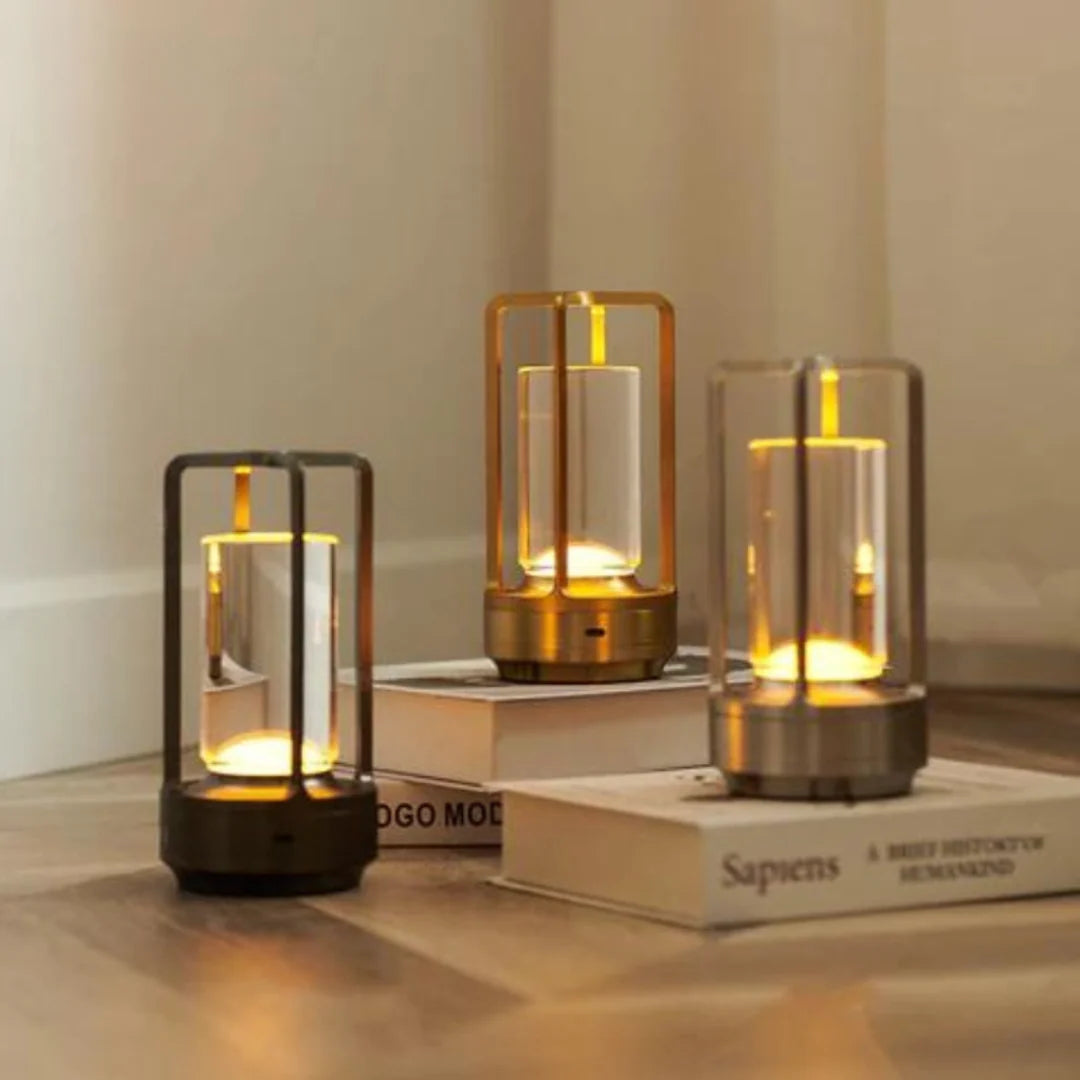 Cordless table lamp featuring a rechargeable LED design in Scandinavian style, available in gold, silver, and black finishes. 4