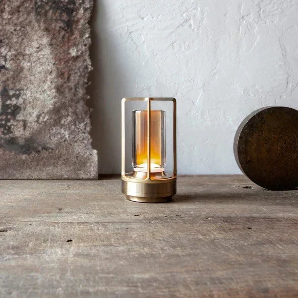 Cordless table lamp featuring a rechargeable LED design in Scandinavian style, available in gold, silver, and black finishes. 5