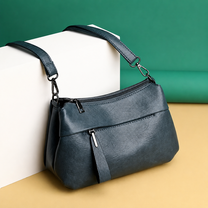 Lightweight crossbody bag for women featuring smart compartments and an adjustable strap, perfect for everyday use. 3