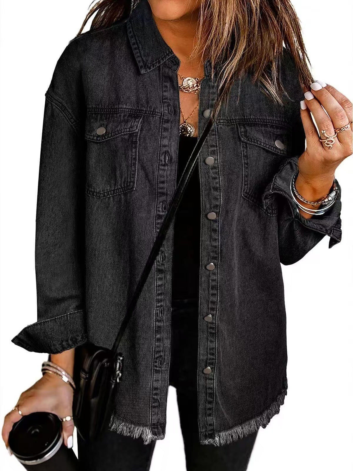 Classic blue oversized denim jacket for women featuring a relaxed fit and functional pockets, perfect for casual outings and layering. 0