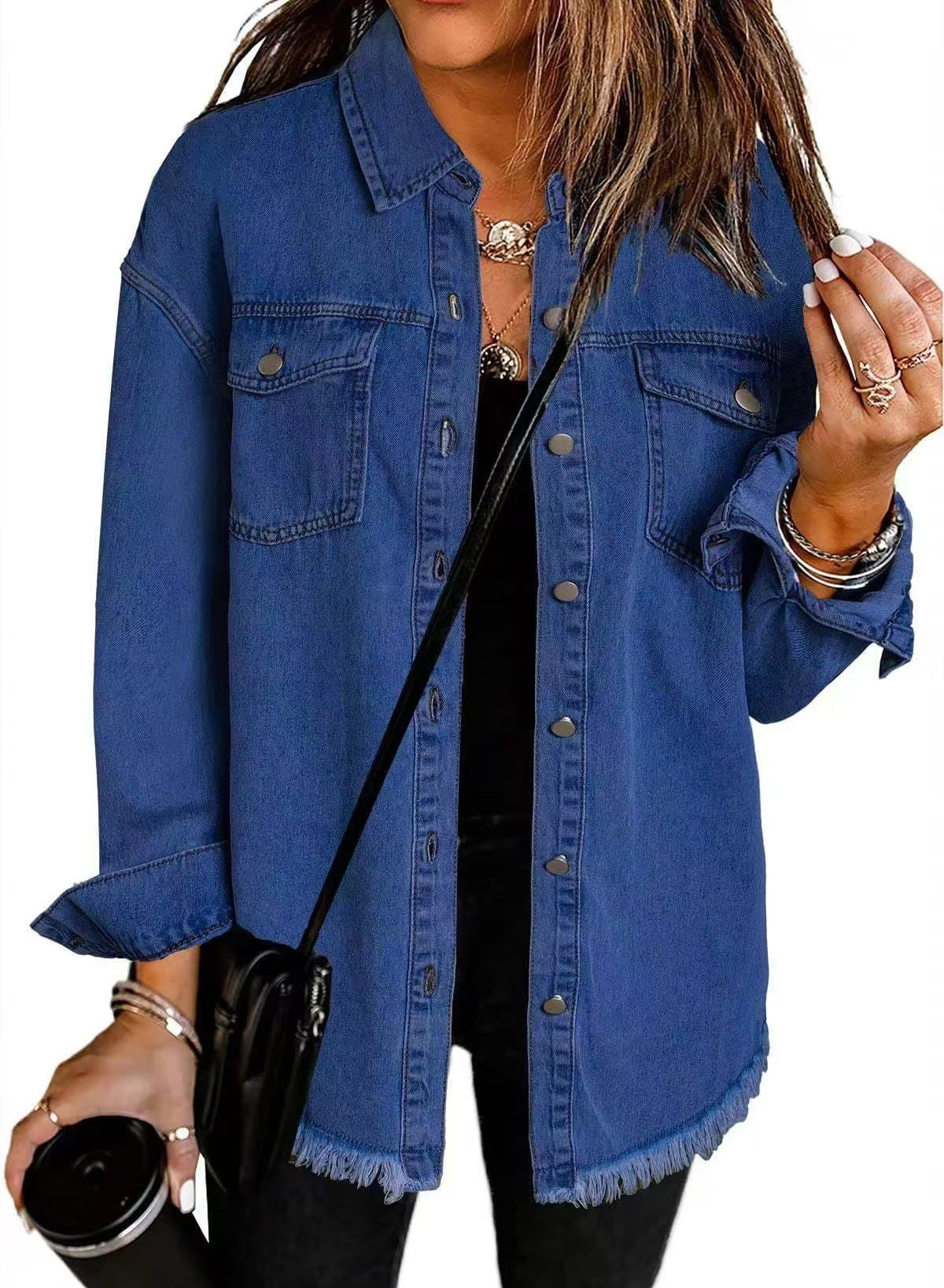 Classic blue oversized denim jacket for women featuring a relaxed fit and functional pockets, perfect for casual outings and layering. 2