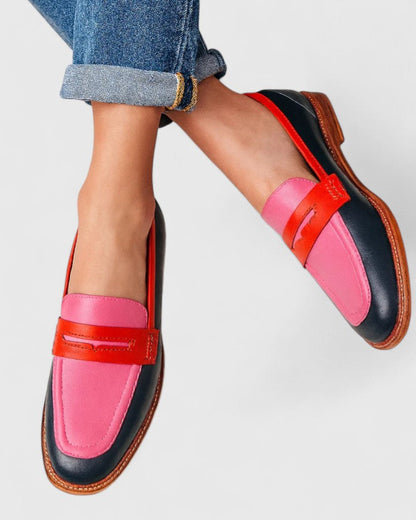 Elegant black leather loafers for women featuring cushioned insoles and a timeless design, perfect for both casual and formal occasions. 0