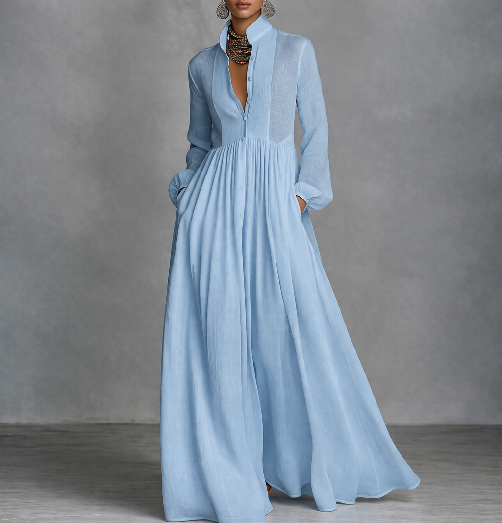 Elegant maxi dress featuring a flattering silhouette, made from lightweight fabric, with long sleeves and a classic white color, perfect for both casual outings and special occasions 1