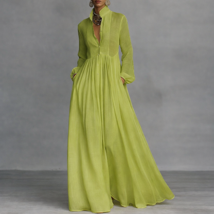 Elegant maxi dress featuring a flattering silhouette, made from lightweight fabric, with long sleeves and a classic white color, perfect for both casual outings and special occasions 2