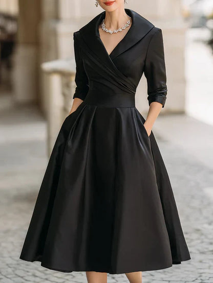 Elegant midi dress featuring a flattering V-neckline and a defined waist, perfect for formal occasions. 0