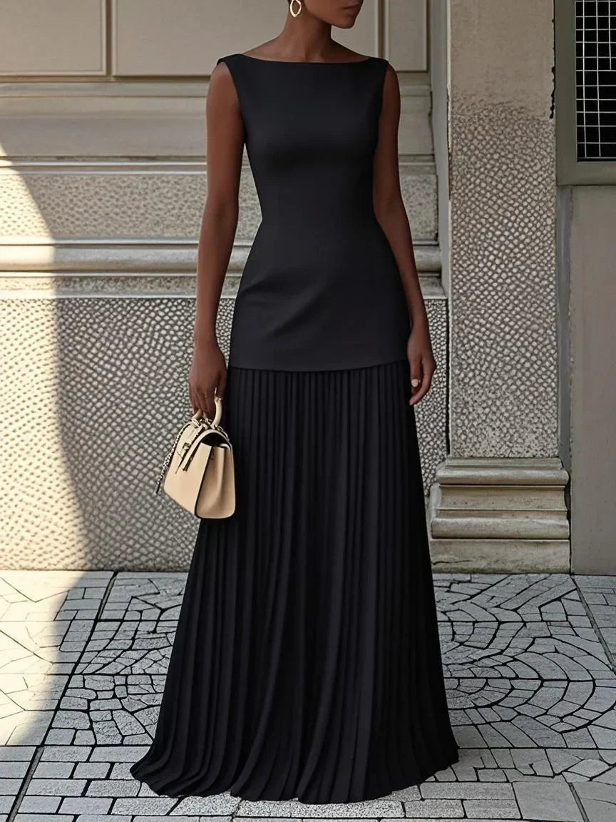 Elegant evening gown featuring a pleated skirt and boat neckline, perfect for formal occasions, designed for a sophisticated and stylish look. 9