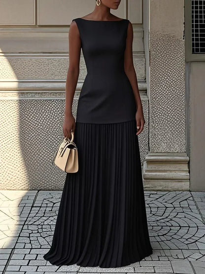 Elegant evening gown featuring a pleated skirt and boat neckline, perfect for formal occasions, designed for a sophisticated and stylish look. 9