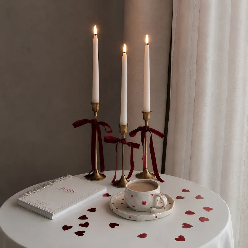 Flameless LED candle tapers for chandelier lighting in slim design, available in customizable finishes, offered in 4, 6, or 10 6