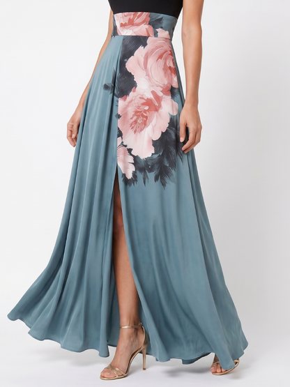 Floral maxi dress with halter neckline and front slit, perfect for elegant evening wear, crafted from smooth fluid fabric. 2
