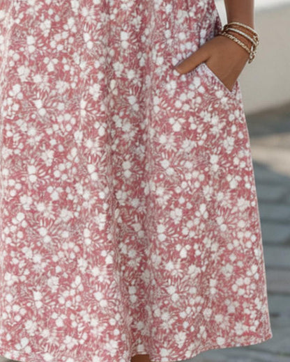 Floral midi dress featuring lightweight fabric, perfect for summer, designed with a loose fit for ultimate comfort. 1