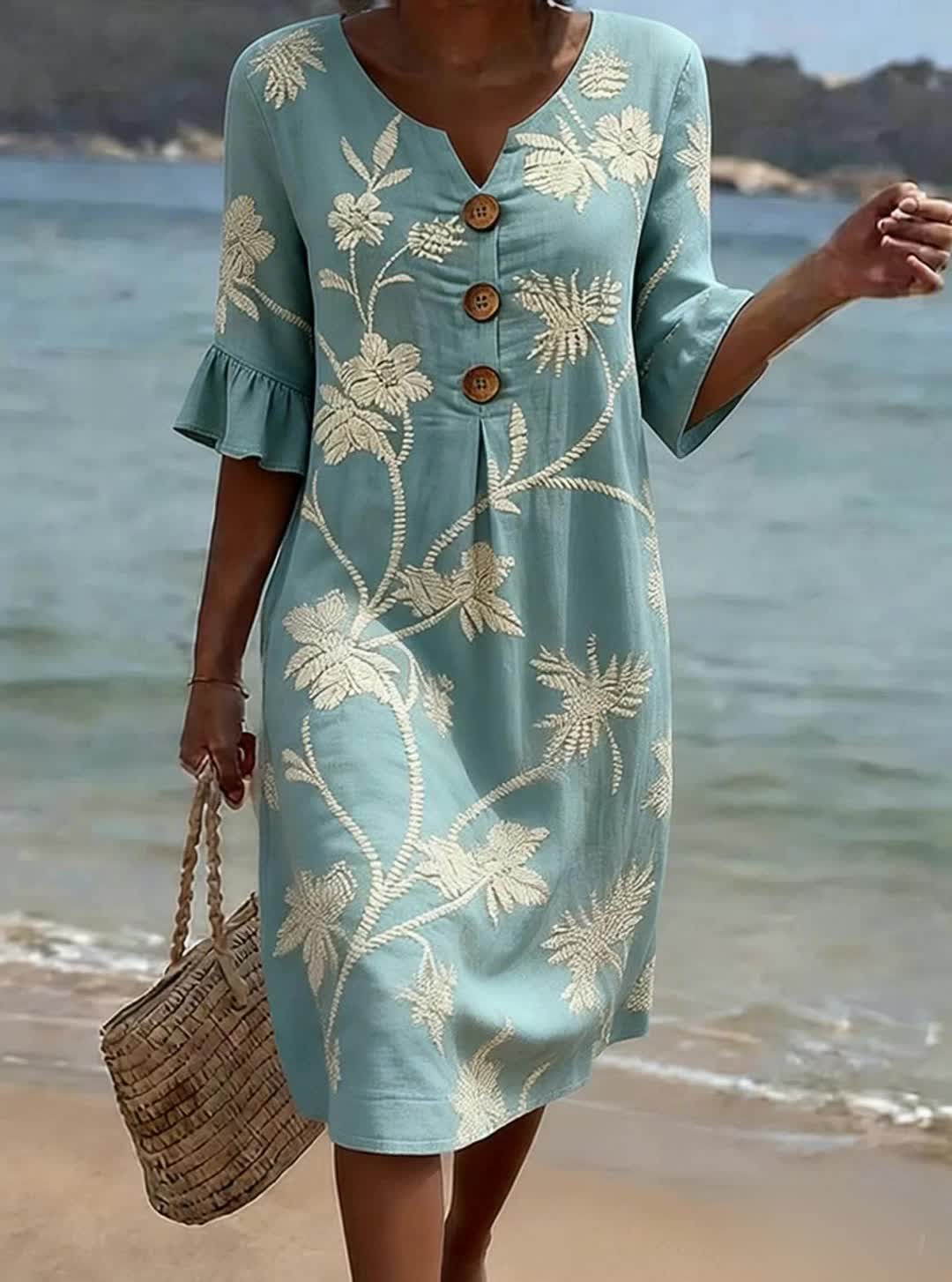 Floral sundress for women featuring flared sleeves and front buttons, designed for lightweight comfort in summer, perfect for casual outings. 0