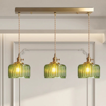 Vintage green glass pendant light with adjustable hanging feature, perfect for kitchen and dining areas, showcasing a stylish design that enhances home decor. 2