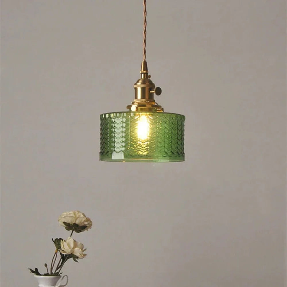 Vintage green glass pendant light with adjustable hanging feature, perfect for kitchen and dining areas, showcasing a stylish design that enhances home decor. 3