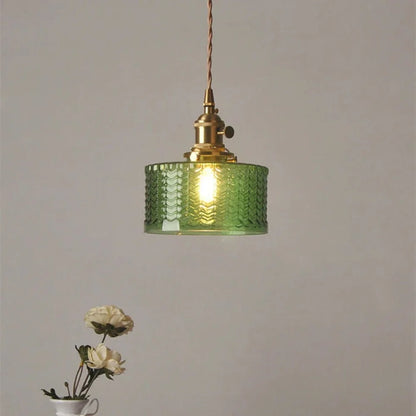 Vintage green glass pendant light with adjustable hanging feature, perfect for kitchen and dining areas, showcasing a stylish design that enhances home decor. 3