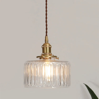 Vintage green glass pendant light with adjustable hanging feature, perfect for kitchen and dining areas, showcasing a stylish design that enhances home decor. 6