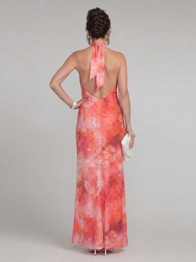 Halter neck maxi dress featuring a vibrant printed pattern, designed for elegance with a lightweight sleeveless style, perfect for special occasions. 3