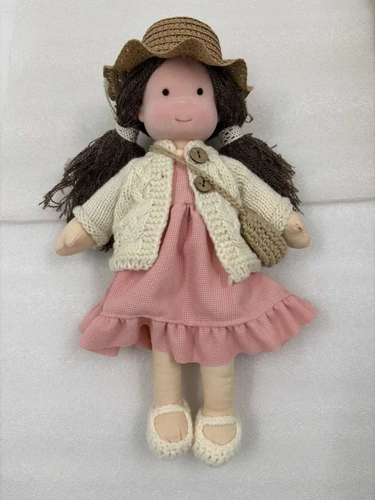 Handcrafted Waldorf doll made from soft fabric and sustainable materials, featuring a washable design, perfect eco-friendly toy for kids. 1