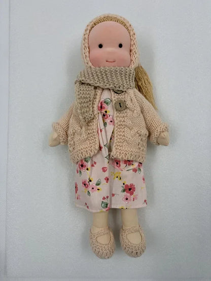 Handcrafted Waldorf doll made from soft fabric and sustainable materials, featuring a washable design, perfect eco-friendly toy for kids. 2