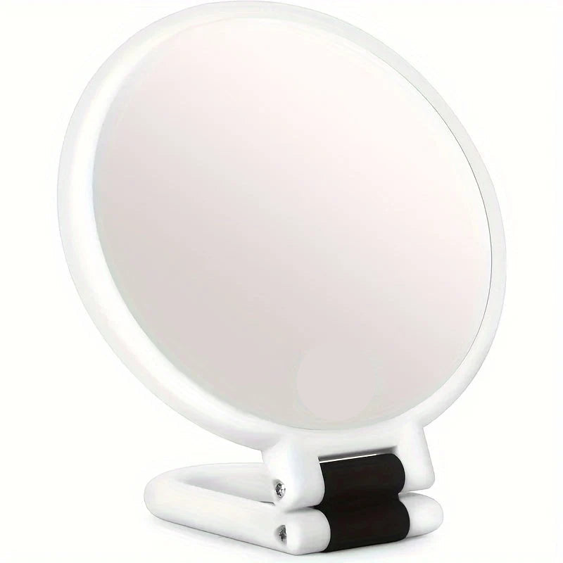 Handheld makeup mirror featuring 30X/40X magnification and a 360-degree folding handle, designed in a sleek black and white plastic finish 2
