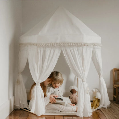 Kids play tent featuring roll-up walls and a sturdy wooden frame, designed in a Boho pavilion style with ecru cotton canvas, perfect for imaginative 2