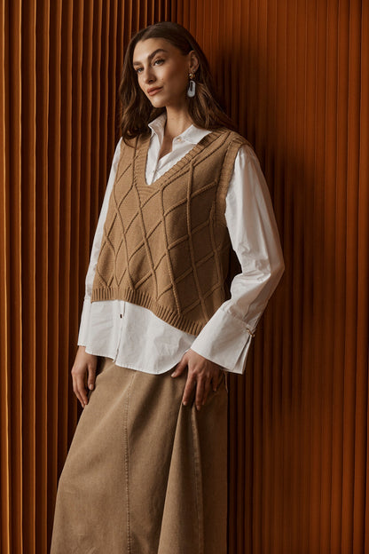 Knitted vest for women featuring a V-neck and checkerboard pattern, made from breathable cotton in a stylish mocha color, perfect for layering. 0