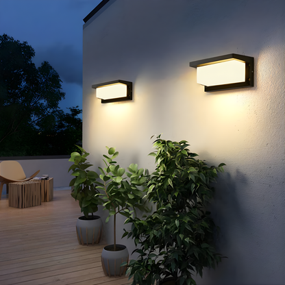 LED outdoor wall light featuring a motion sensor, designed for durability with IP65 weatherproof rating, emitting warm white light for enhanced security and ambiance. 5