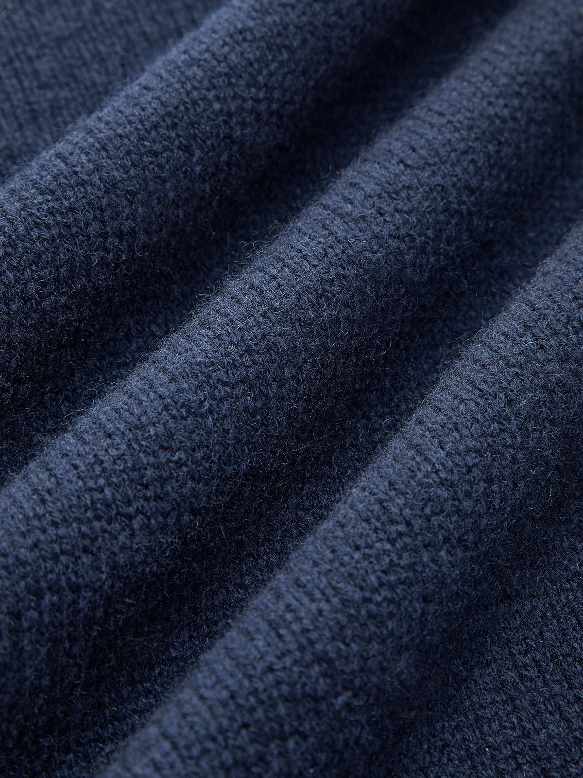 Layered knit polo sweater in navy featuring a denim collar and gold-tone buttons, perfect for stylish and casual outfits. 4